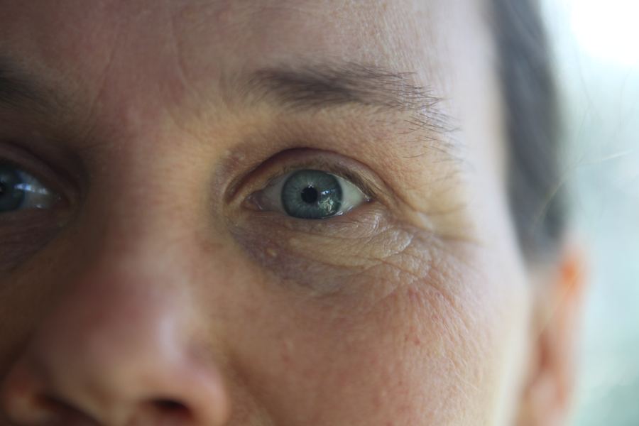 Extreme close-up of a blue-grey eye